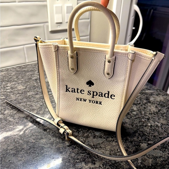 kate spade Handbags - Kate Spade mini tote pebbled leather parchment.